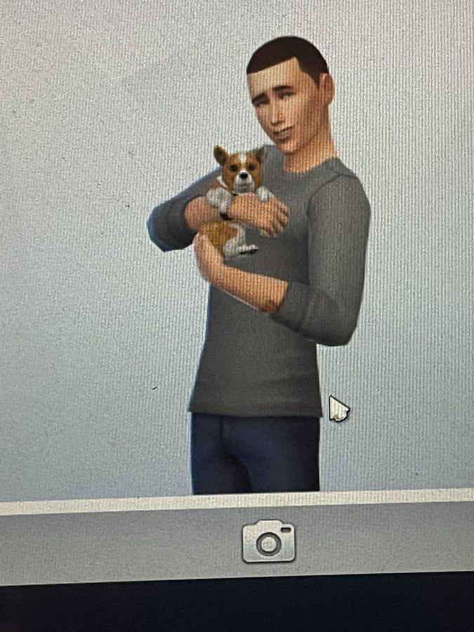 A Sim man who looks strangely like Jack Manifold because Sims 4 random generation is weird, holding a small puppy.